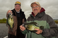 Larry Lashley and Tim Fischbach with Crappies caught on Leech Lake