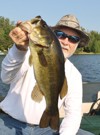 Greg Clusiau With Largemouth Bass