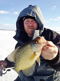 image of Ray Welle holding Crappie