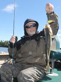 Greg Clusiau Holding Walleye