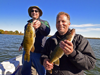 Tim and Matt Higgins showing off fish 