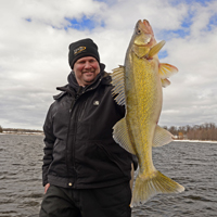 image of Jon Thelen with giant Walleye