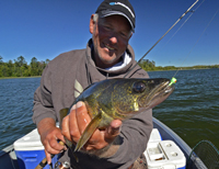 Walleye Fishing Guide Jeff Sundin with Walleye in hand