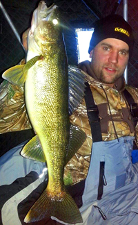 image of Jake Kangas holding large Walleye
