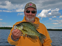 image of Terry Brock holding big Crappie