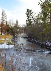 image of the Deer River with its first ice cover