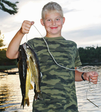 image of Bren Taschuk with Rainy Lake Walleyes