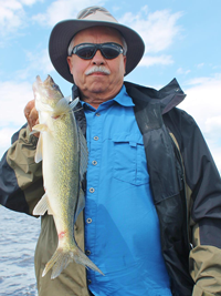 image of Terry Wickstrom holding nice Walleye