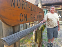 image of Jeff Kuehl with mixed bag of Walleye Pike and Perch