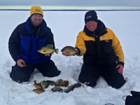 image of Jon Thelen and Jeff Sundin with nice catch of panfish