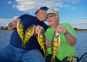 image of kyle and karen reynolds with perch