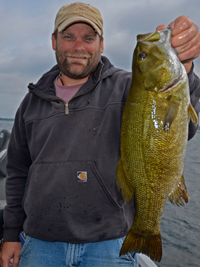 image of Chris Andresen with Smallmouth Bass from Trout Lake
