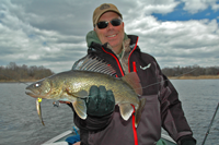 image of Mark Huelse holding large Walleye