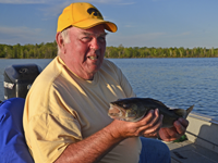 image of Virgil Krug with nice Lake Winnie Walleye