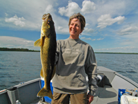 image of Jan Bopp with a large Walleye