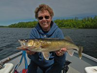 image of Judy Gandy holding large Walleye