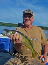 image of Rich Riegel holding a nice Walleye