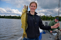 image of Ashley holding a nice Bowstring Walleye