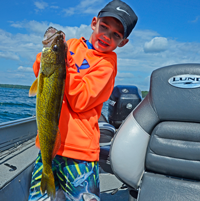 image of Owen Cheatham holding big Walleye