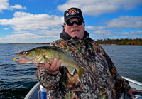 image of Marty Glackin with nice Lake Winnie Walleye