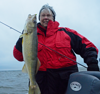 image of Penny Becker with big Leech Lake Walleye