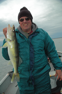 Image of Dave Olson with large Leech Lake Walleye