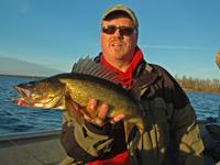 image of Tom Cashman with big Walleye