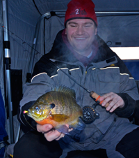 image of Jace Swanson holding big Bluegill