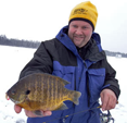 image of Jon Thelen with large Bluegill