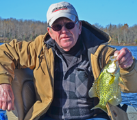 image of fisherman wioth nice Crappie