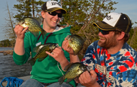 image of anglers holding crappies