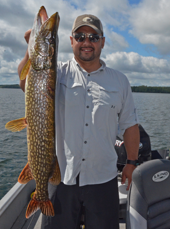 image of Jeff Minton with big Pike