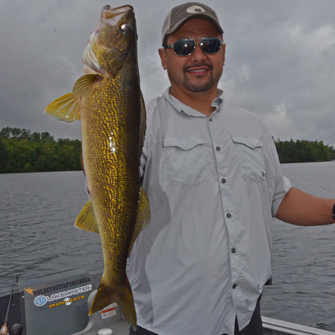 image of jeff minton with gig walleye