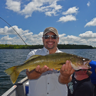 image of jeff minton with big walleye