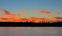 image of fall sunset over the water