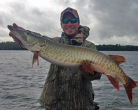 image of James Merenda holding fat Musky