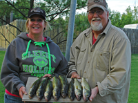 image of Kirk and Mari Petersen with nice Walleyes