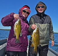 image of Bob and Bonnie Baird with a pair of Smallmouth Bass
