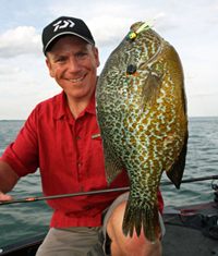 image of Jason Halfen and young angler with slab crappies