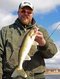 image of Austin Jones with nice Walleye