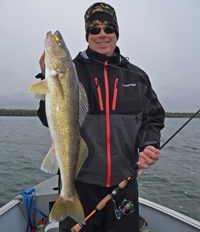 image of Mark Huelse with big walleye
