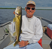 image of Bob Carlson holding big walleye