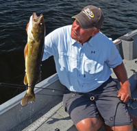 image of Jeff sundin with big Walleye