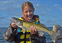 image of Ella Seger with Winnibigoshish Walleye