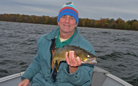 image of Tim Higgins with nice Walleye from Winnibigoshish