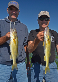 image of Jim and Chuck with pair of Walleyes