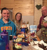 image of kate and joelle bolos having fish fry