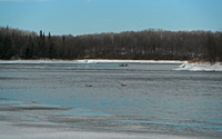 image of small boat on the rainy river