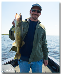 image of Adam Huelse with Red Lake Walleye