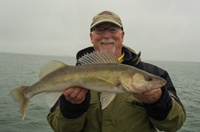 image of Craig Anderson with big walleye from leech lake